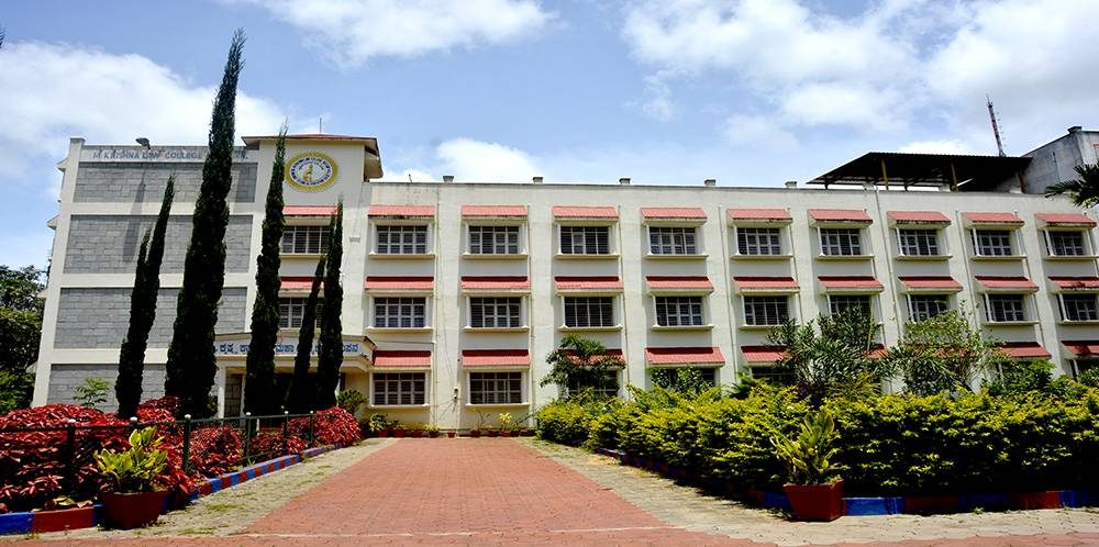 College main block with garden path